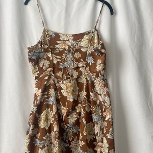 Brown silk floral dress with ties in the back and a small slit in front. large